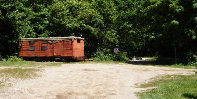 Don't be put off by this beat-up trailer on the fairgrounds; the trailhead is here, with adjacent parking.