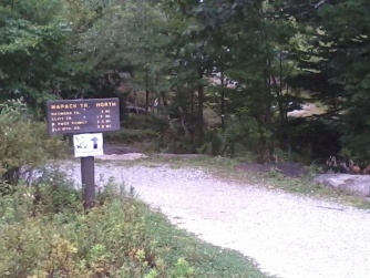 The white addition to the trail sign is an invitation to come to the Pack Monadnock summit for September's raptor watch.