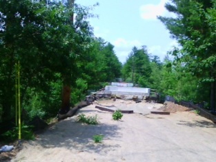 July 2015: the fence is gone, and this will someday be the approach to a river crossing for pedestrians and bicyclists.